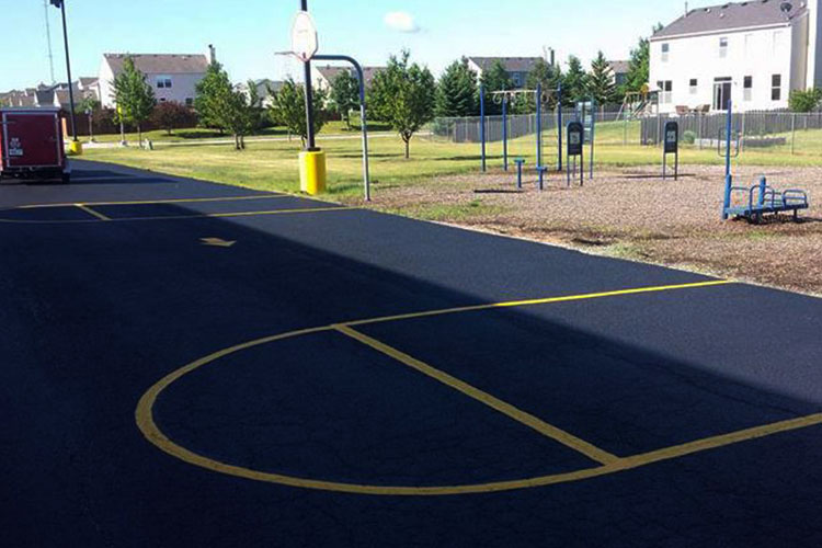Professional Sealcoating, Line Striping, Crack Filling & Hot Patching in Montgomery Illinois